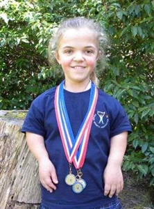 Millie Gains Three Golds at National Sports Event