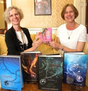 Author Presents Signed Copies of Books to School Library