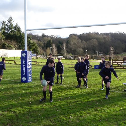 Students playing rugby