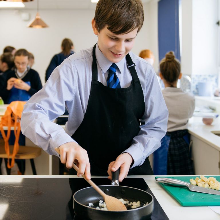 boy frying onions