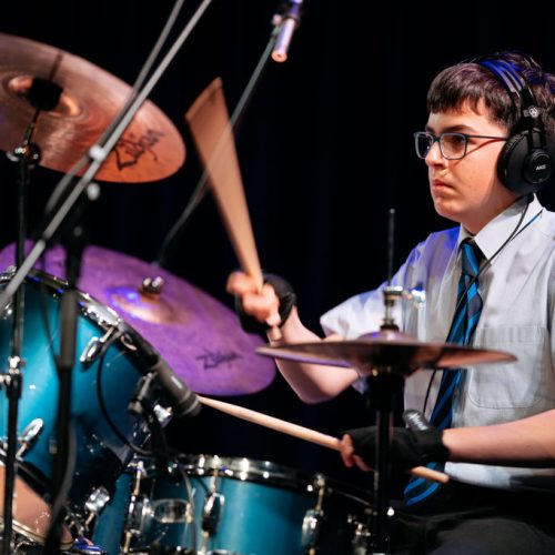 boy playing the drums