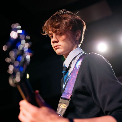 Boy Playing the Guitar