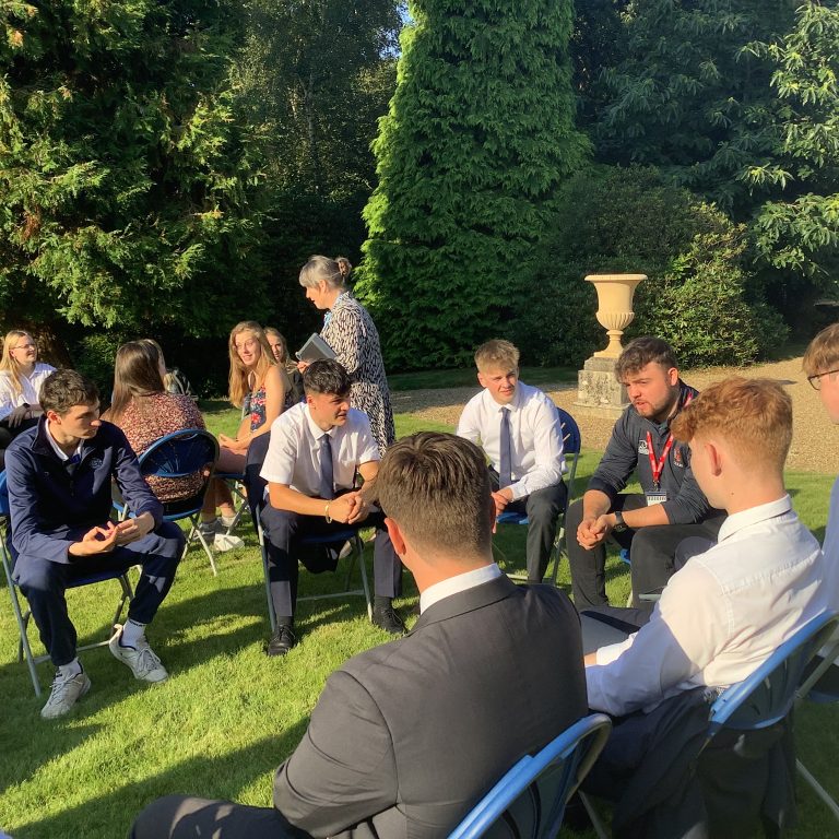 students sat on chairs