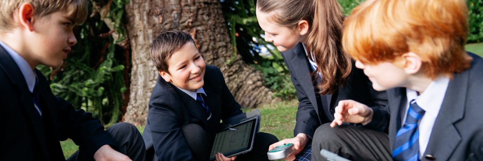 students learning outdoors