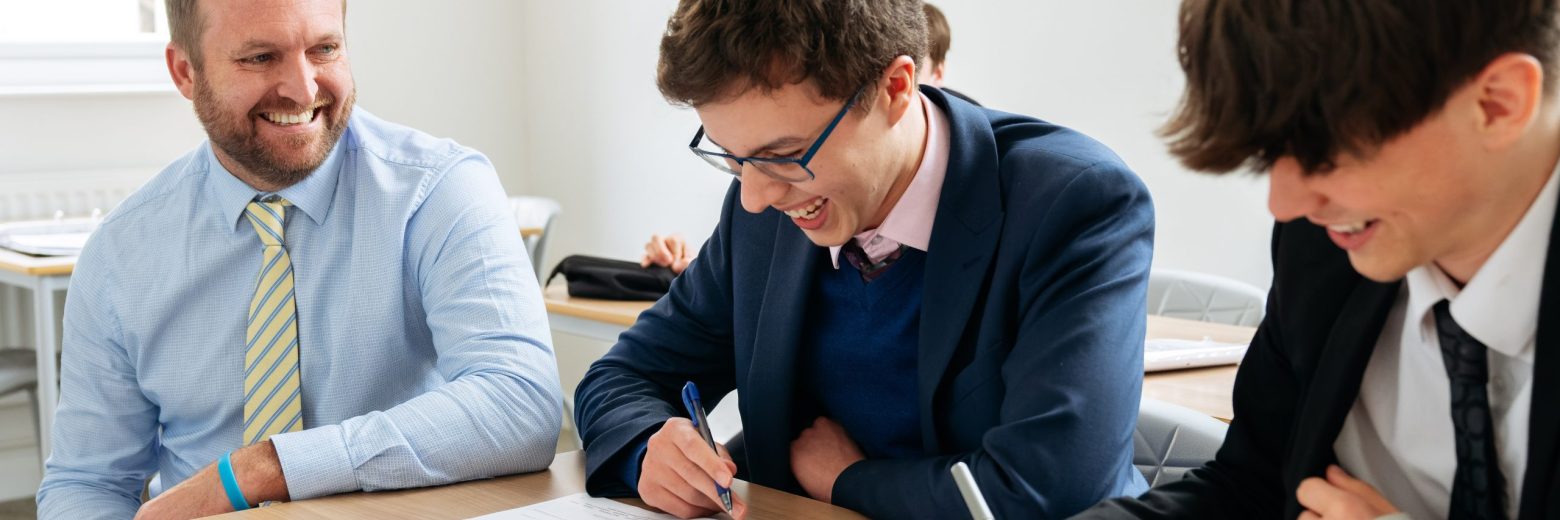 students sat at the desk working