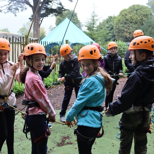 students at an adventure park