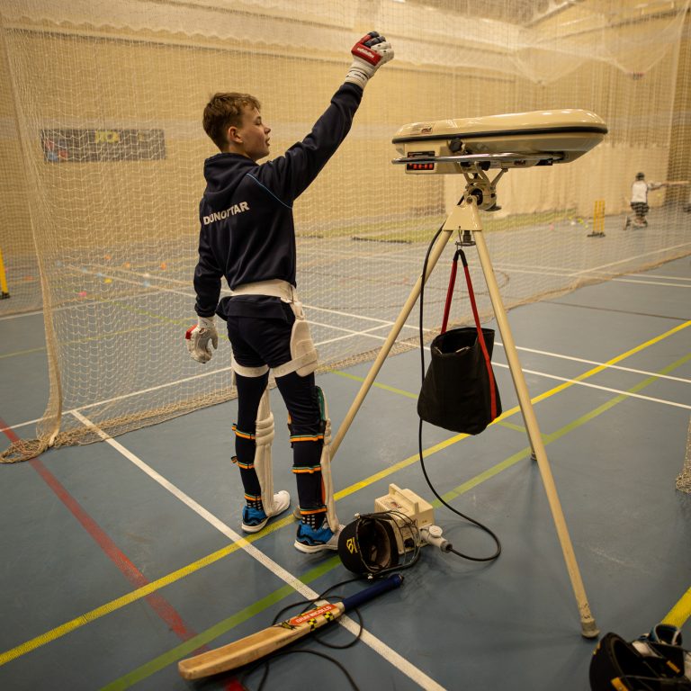 boy using a piece of equipment