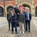 students by a canon
