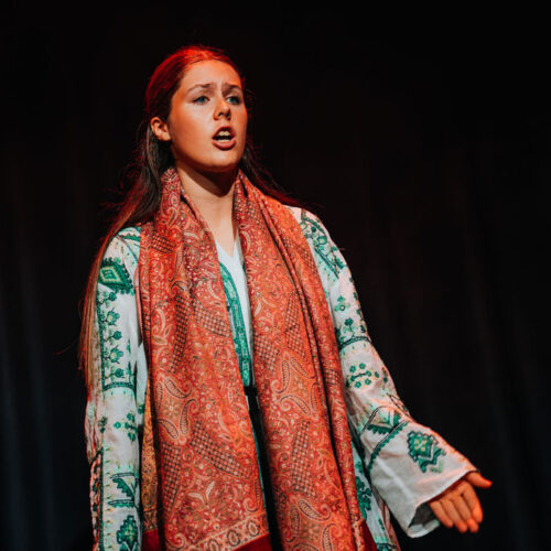 student acting in a performance