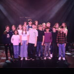 students on stage